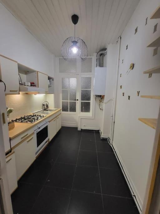 Appartement Style Haussmannien 1 Bedroom Brussel Bagian luar foto